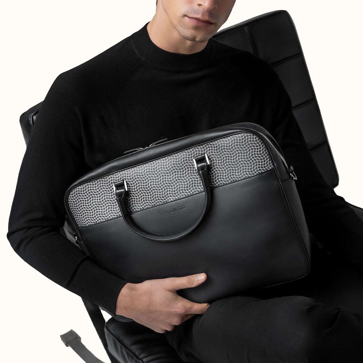 Luxury business bag on desk setup #color_onyx black