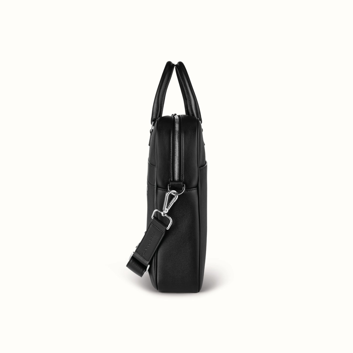 Luxury business bag on desk setup #color_jet black
