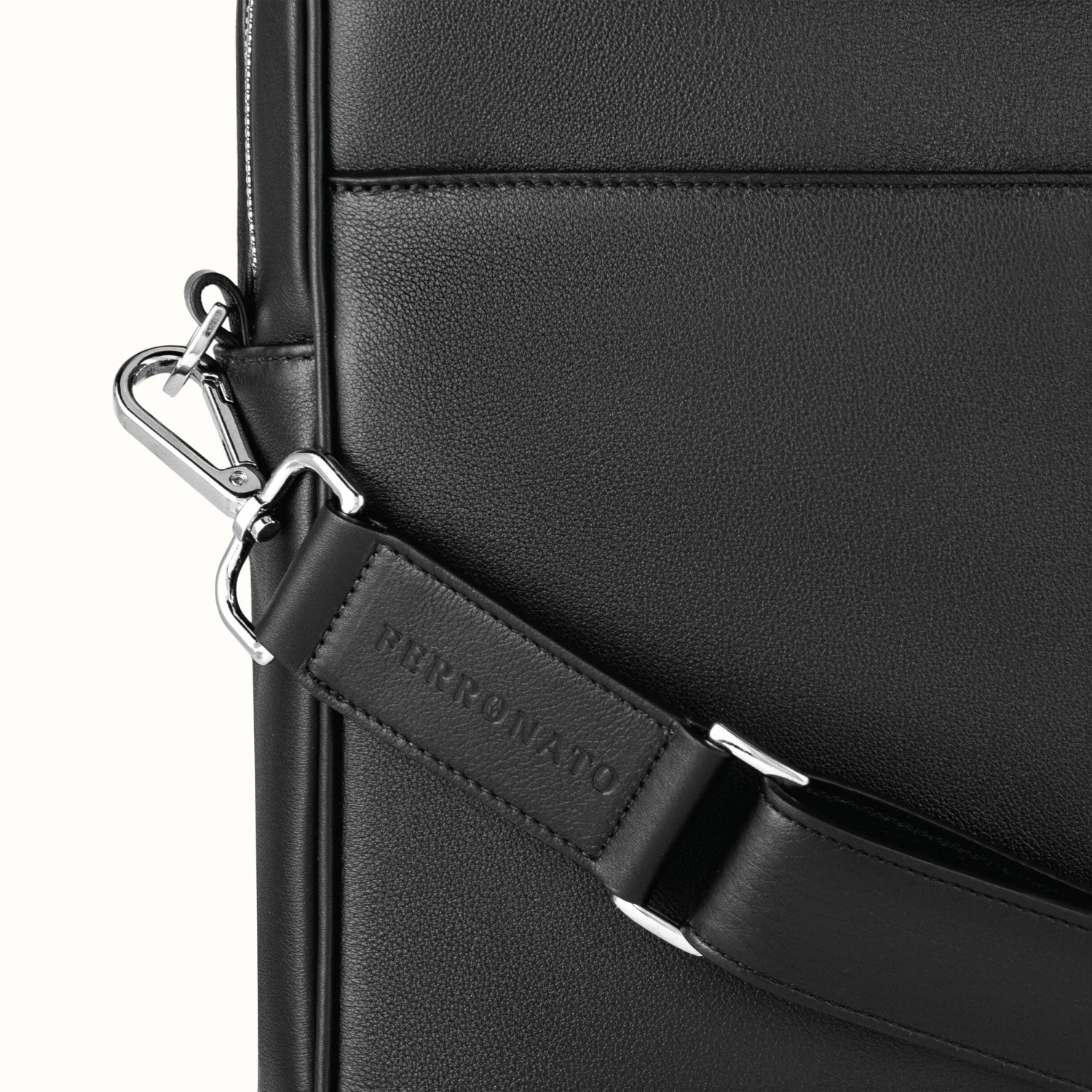 Luxury business bag on desk setup #color_jet black