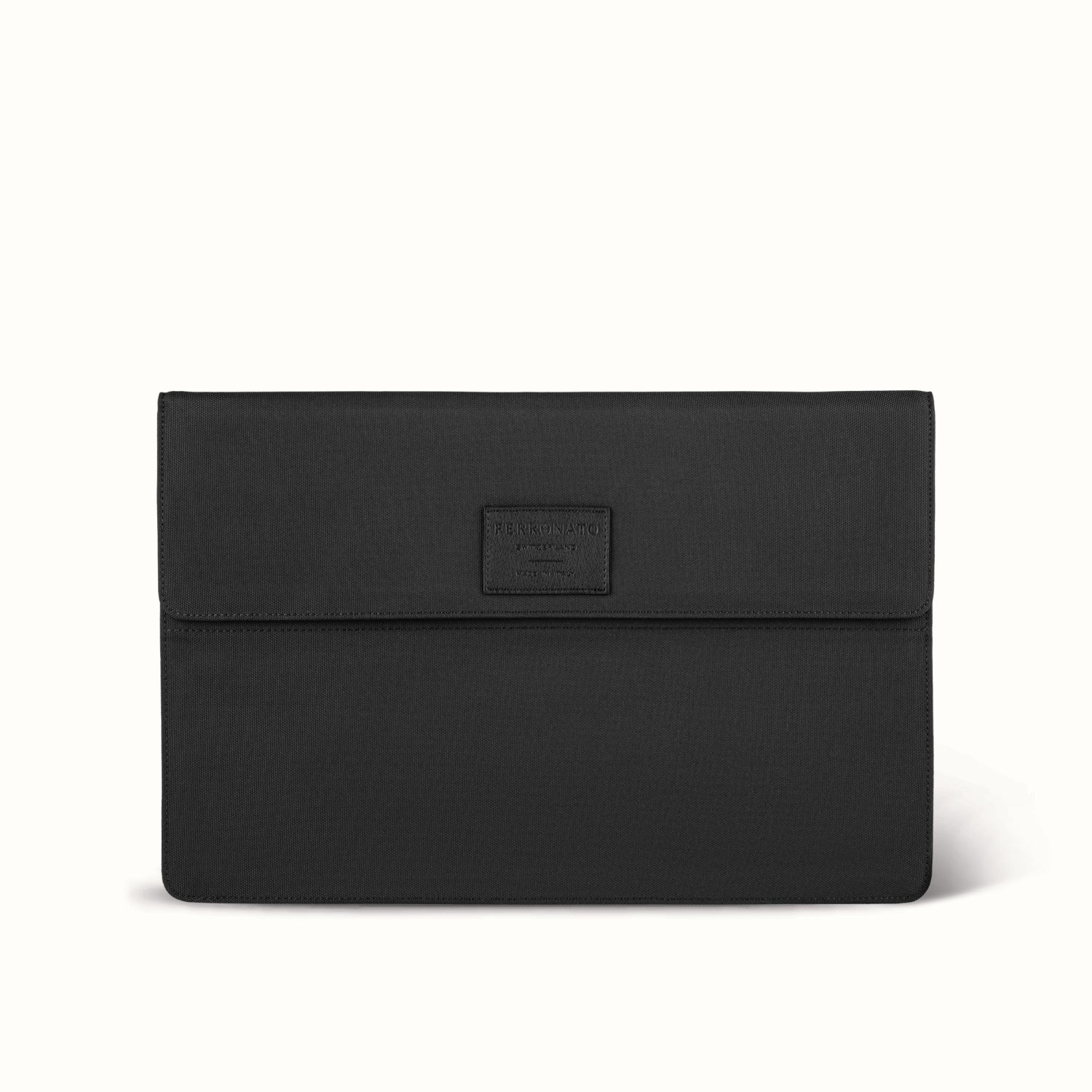 Luxury business bag on desk setup #color_jet black