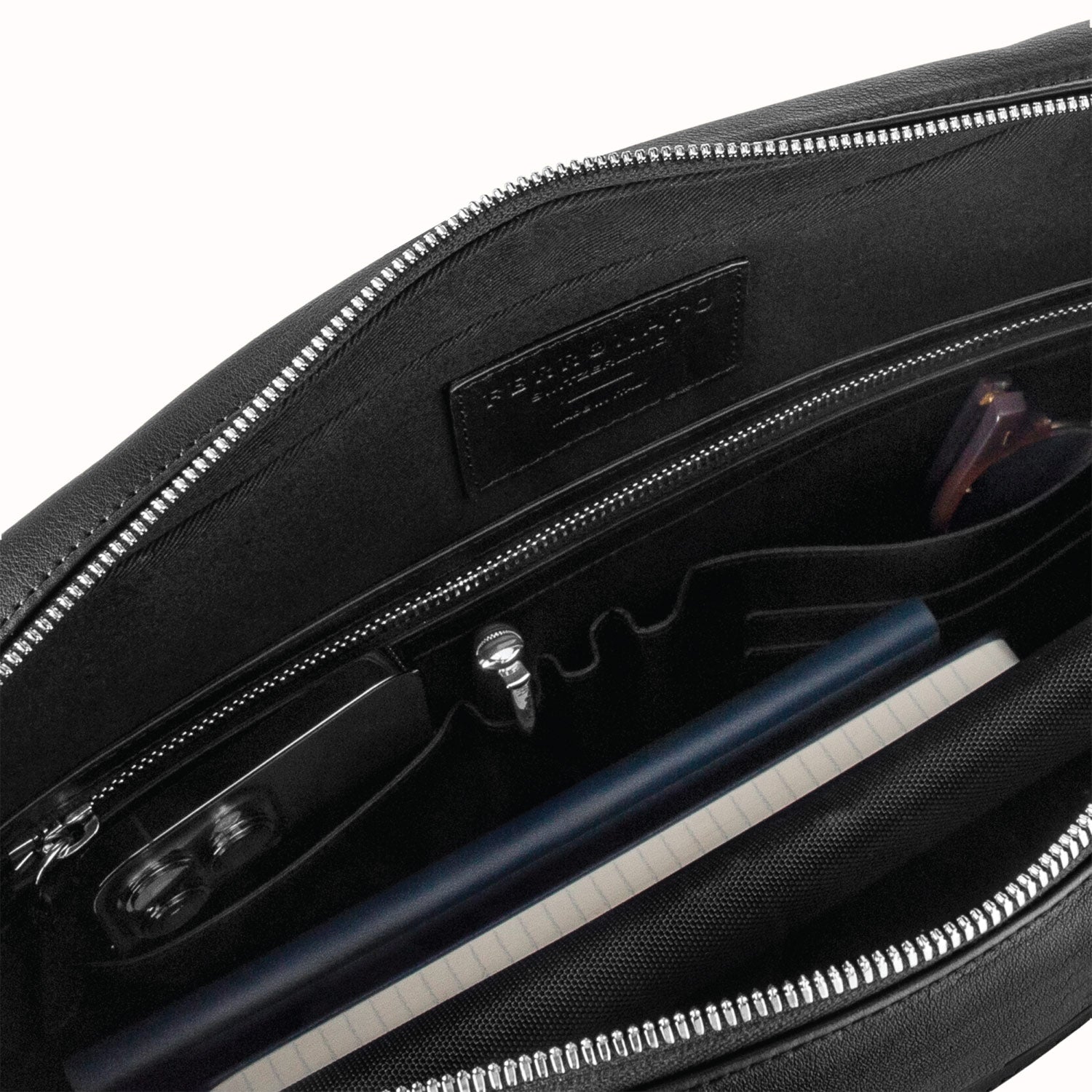 Luxury business bag on desk setup #color_jet black