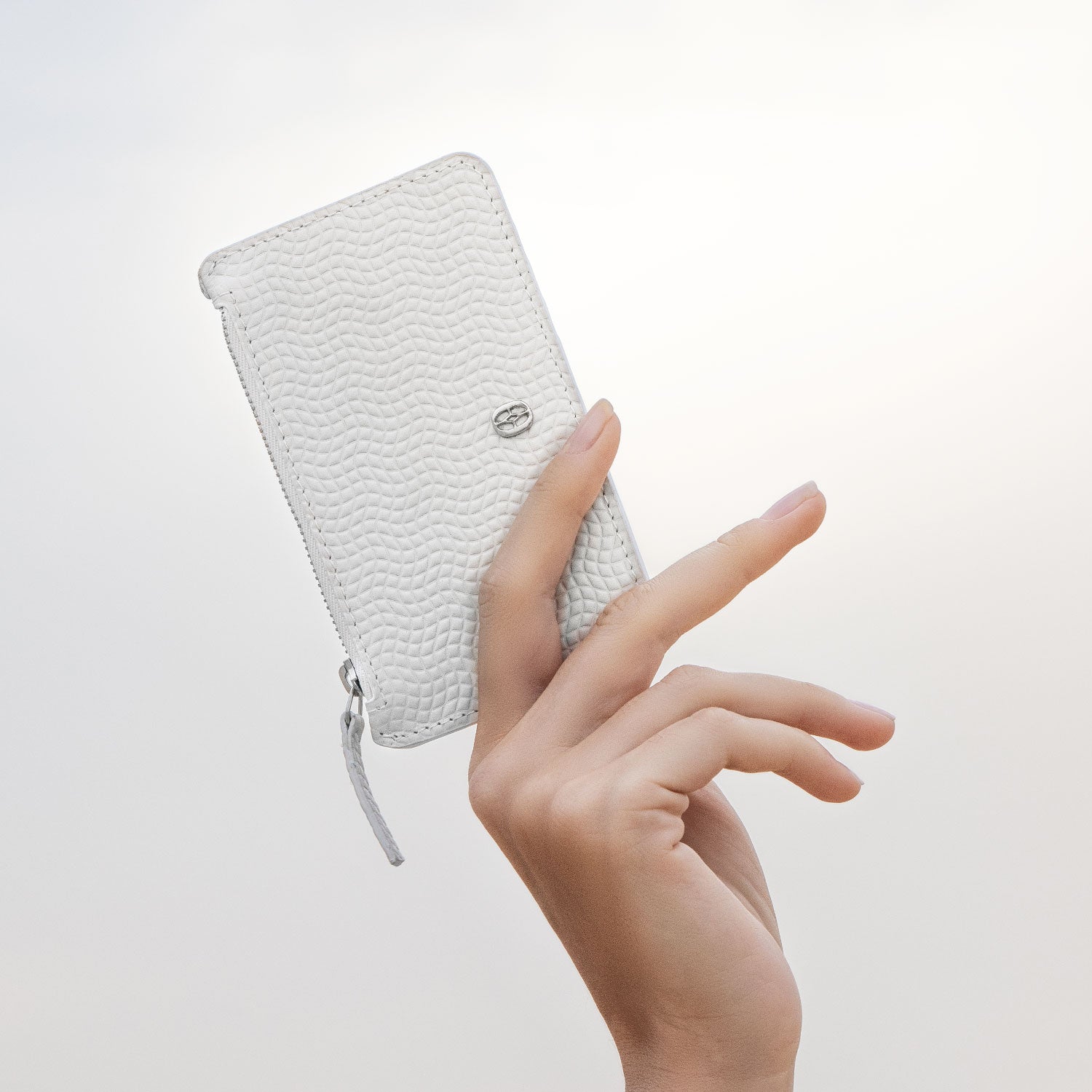 Luxury business bag on desk setup #color_Jet Black