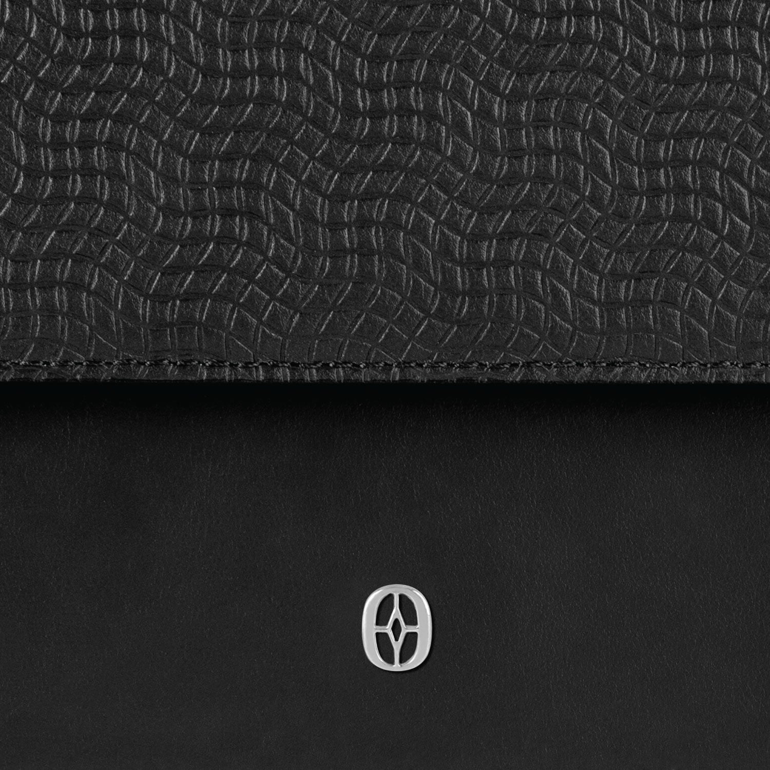 Luxury Swiss handbag for women studio shot #color_Jet Black