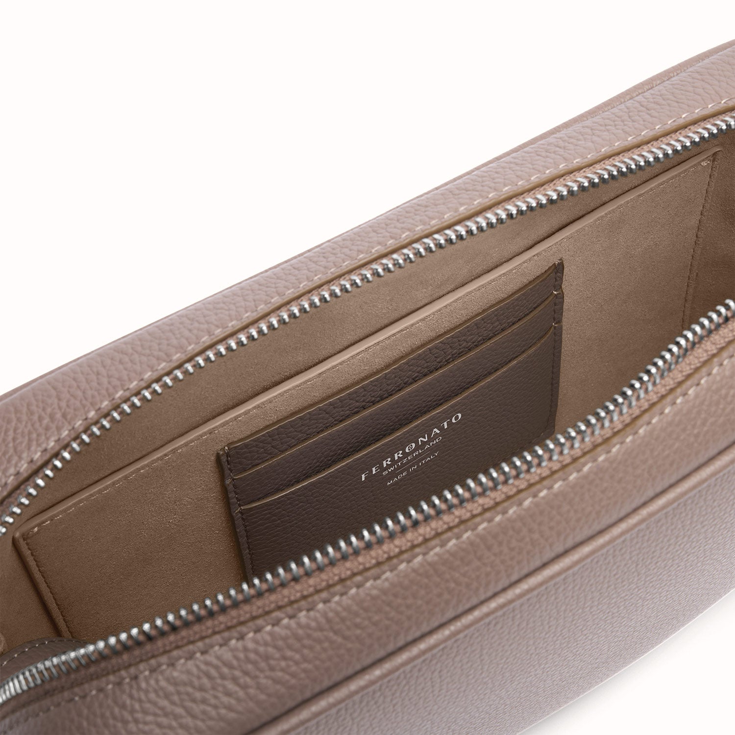 Sustainable Swiss travel handbag display #Color_Serene Taupe