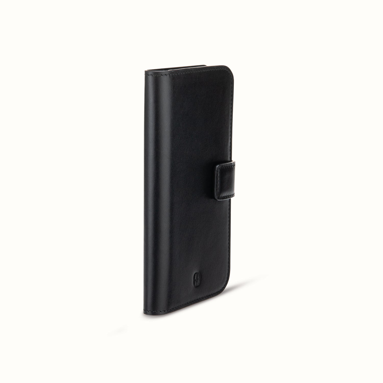 Ferronato Nova Phone Cover — Angled view of the cover closed, emphasizing the slimness and structure of the Italian calf leather #color_jet black