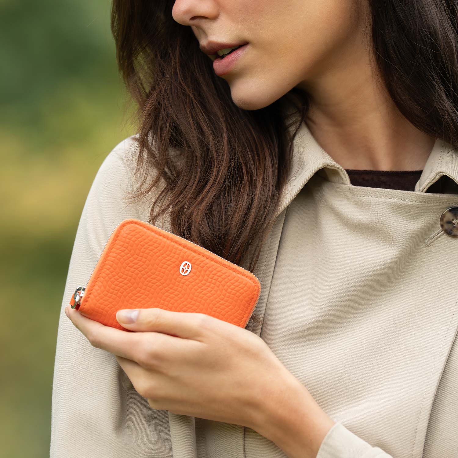 Ferronato women’s RFID wallet on model #color_Vibrant Orange