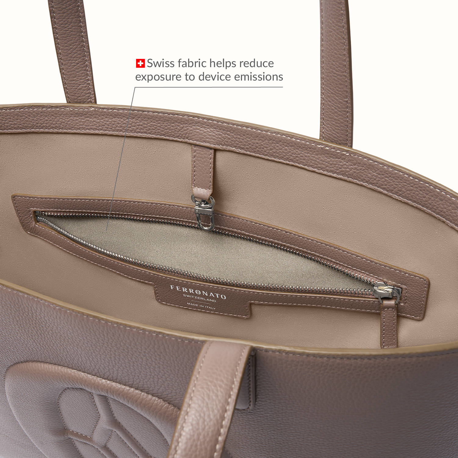 Sustainable Swiss travel handbag display #color_Serene Taupe