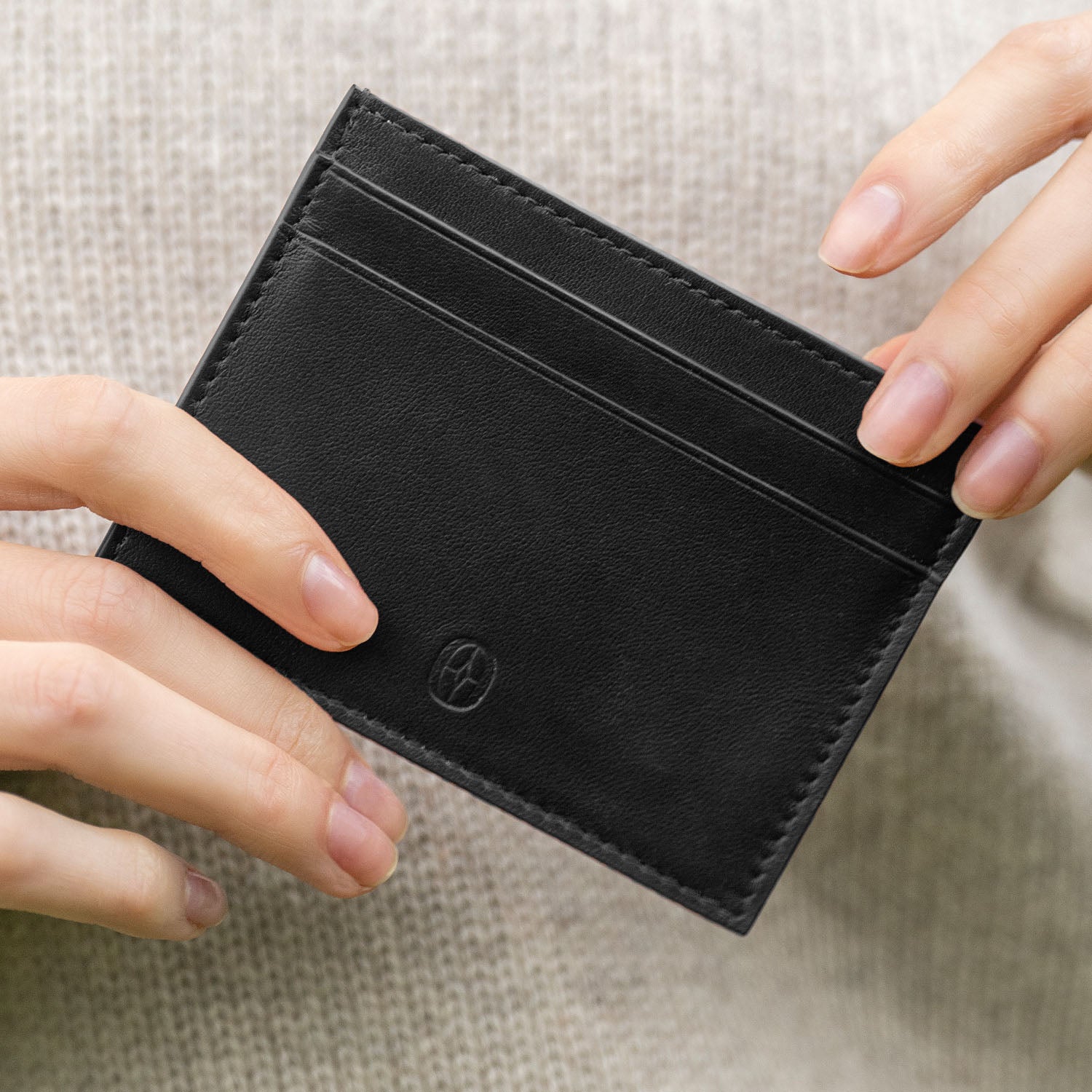 Luxury Swiss minicardholder for studio shot #color_jet black